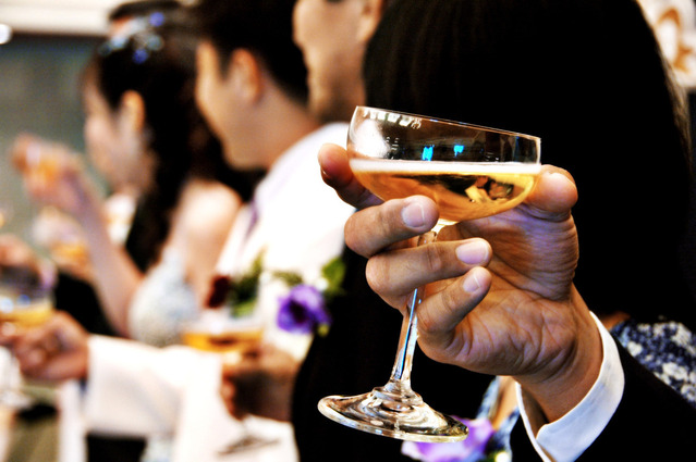 a glass full of champagne during a wedding day feast